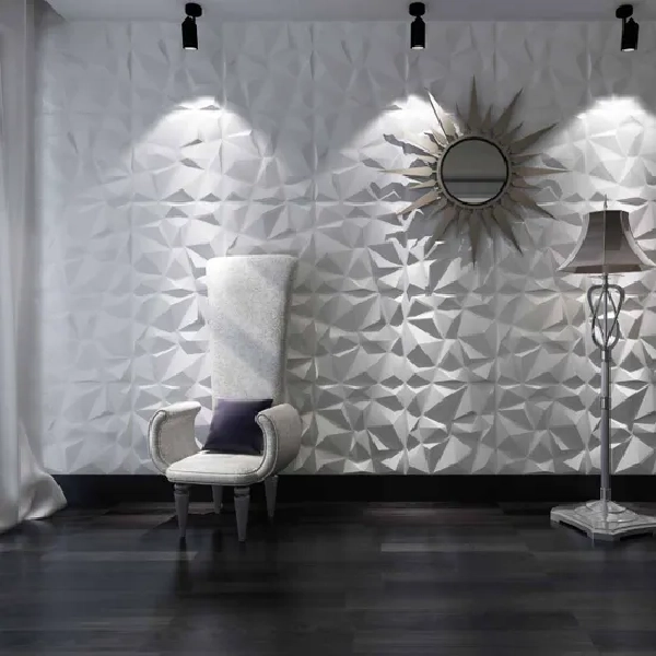 White 3D PVC wall panel with geometric faceted design.