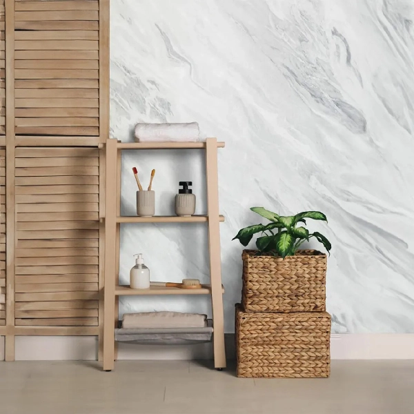 White marble-look PVC paneling in a bathroom setting.